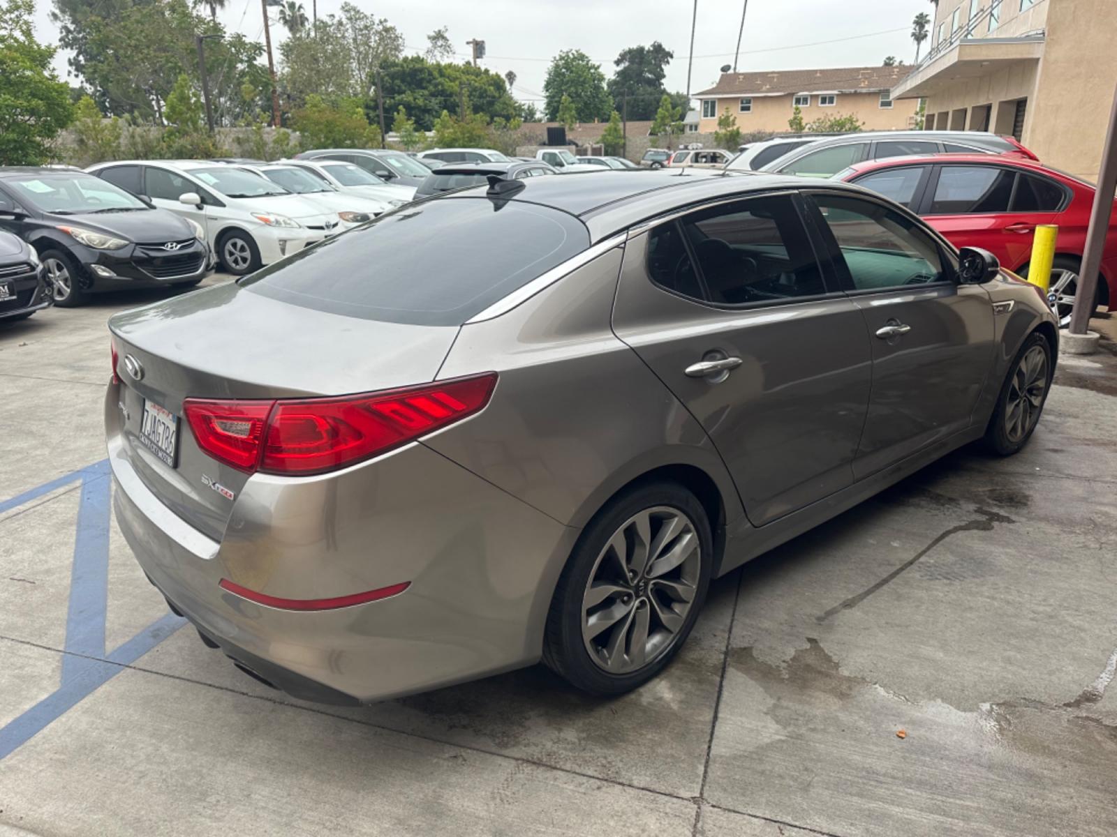 2014 Gray /BLACK Kia Optima SX Turbo (5XXGR4A62EG) with an 2.0L L4 DOHC 16V TURBO engine, 6-Speed Automatic transmission, located at 30 S. Berkeley Avenue, Pasadena, CA, 91107, (626) 248-7567, 34.145447, -118.109398 - New tires! Moon Roof! Nice Interior! Looks and drives good! Bad credit? We can help! We are the bank. All our cars are thoroughly inspected and reconditioned by our technicians. FREE CARFAX report. Stop by or call to speak with our friendly staff. Whether you have bad credit, no credit, bankruptcy, - Photo #4